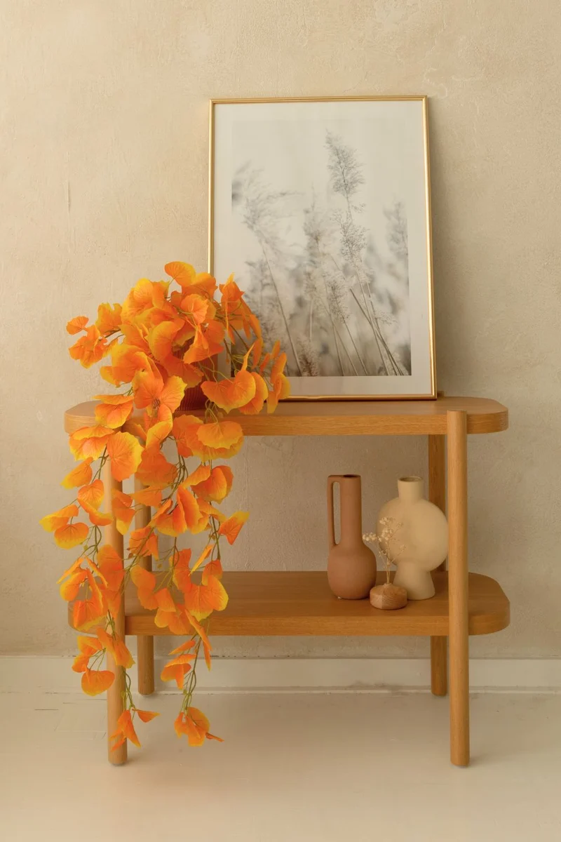 Orangefarbene künstliche Hängepflanze 110cm